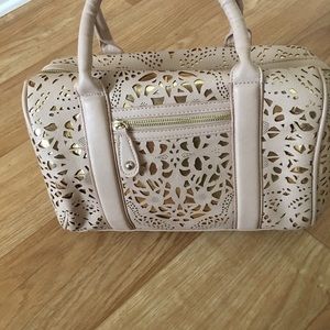 ALDO laser cut hand bag
